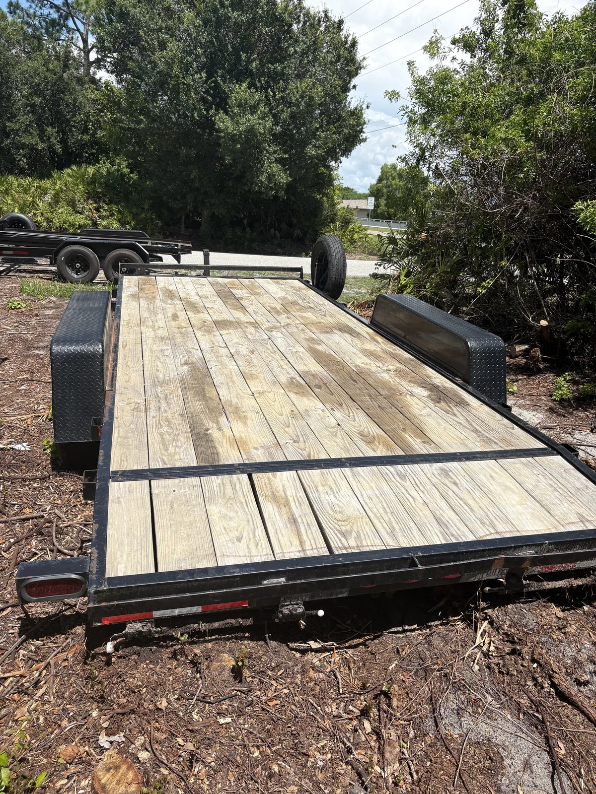 Overhead deck view of 18-foot car hauler trailer